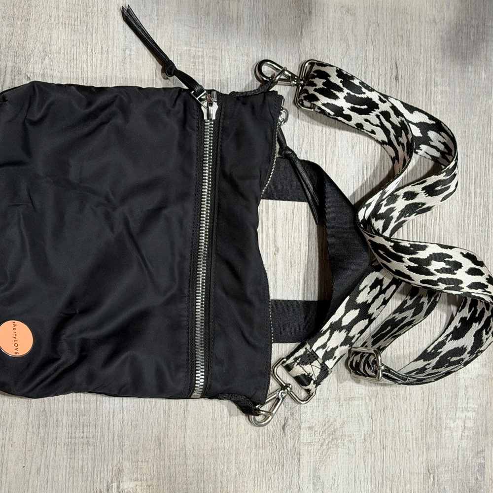 Black Crossbody Bag with Patterned Strap